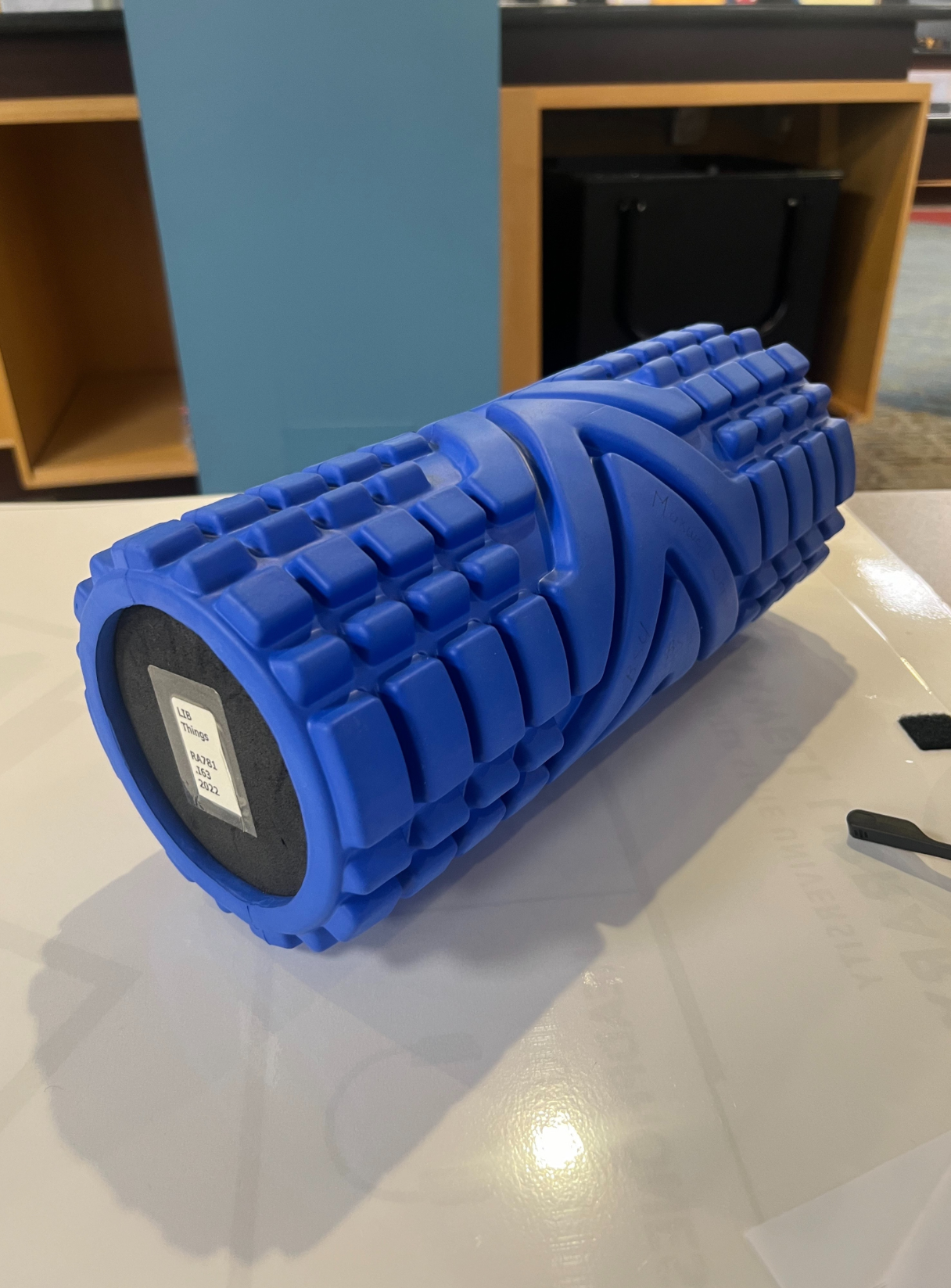 photo of blue foam roller